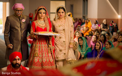 Dazzling Indian bride walking down the aisle. Dazzling Indian bride walking down the aisle.