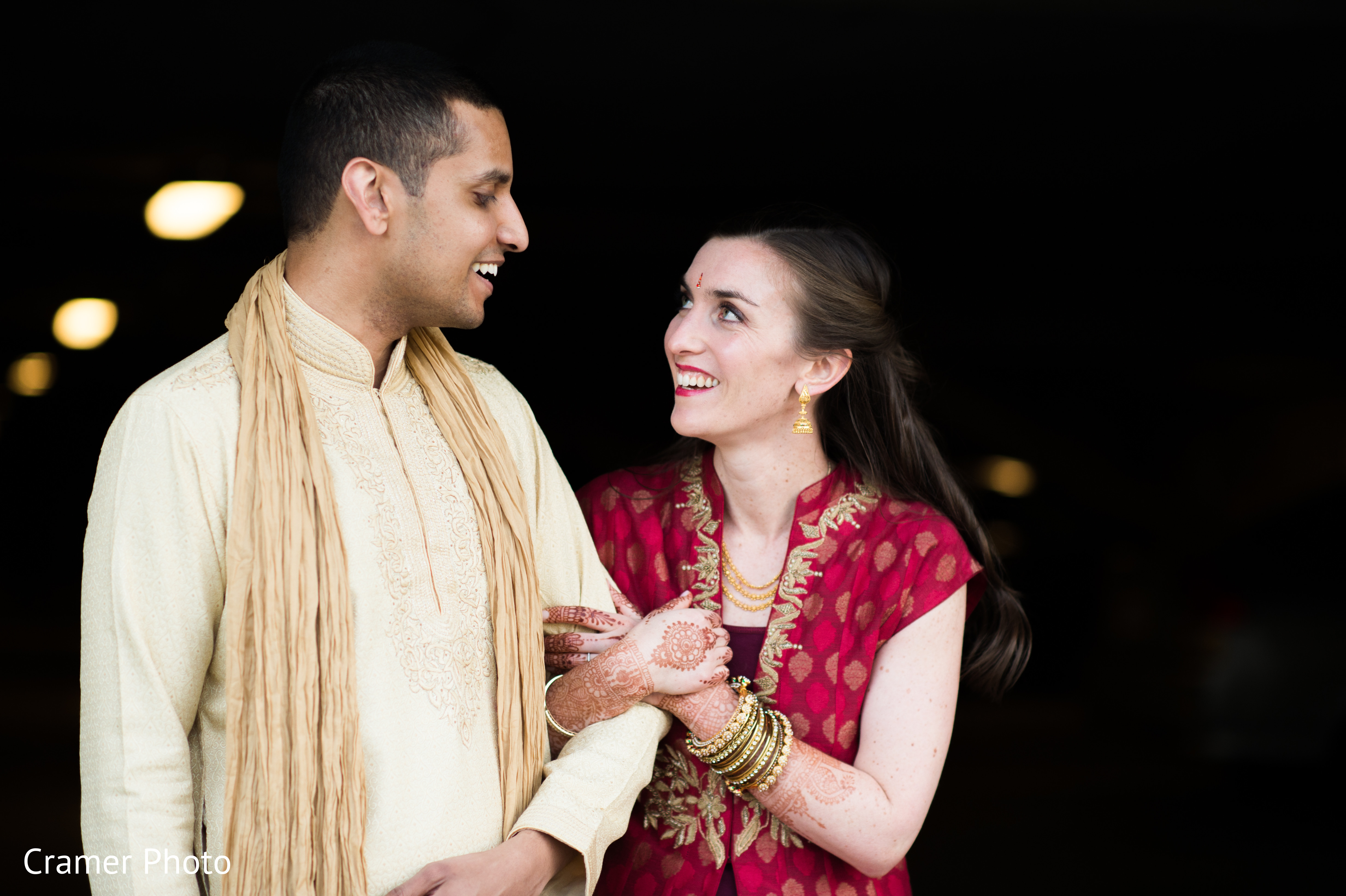 Elegant Indian couple stare at each other during the photo shoot ...