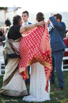 Beautiful capture of the Maharani being covered with the Antarpat Beautiful capture of the Maharani being covered with the Antarpat