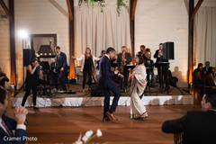 Lovely capture of the Indian groom dancing with his mother. Lovely capture of the Indian groom dancing with his mother.