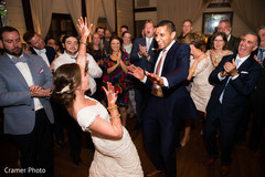 Indian newlyweds happily dance after the ceremony. Indian newlyweds happily dance after the ceremony.