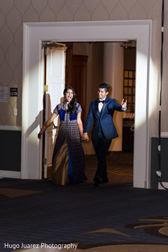 Indian newlyweds entering their wedding reception Indian newlyweds entering their wedding reception