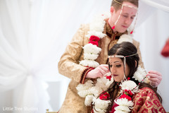 Indian bride receiving her mangalsutra Indian bride receiving her mangalsutra