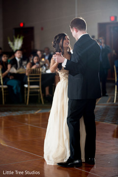 Indian lovebirds having their first dance. Indian lovebirds having their first dance.