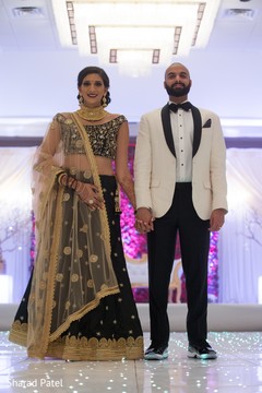 Elegant indian newlyweds at their wedding reception Elegant indian newlyweds at their wedding reception