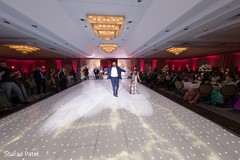 Indian newlyweds making their entrance to wedding reception Indian newlyweds making their entrance to wedding reception