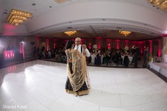 Indian bride dancing with her father capture Indian bride dancing with her father capture