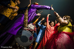 Detail of the traditional dhol being played Detail of the traditional dhol being played