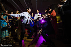 Guests enjoy the dancing at the indian wedding reception Guests enjoy the dancing at the indian wedding reception