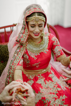 Beautiful indian bride being dolled up for her ceremony Beautiful indian bride being dolled up for her ceremony