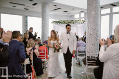 Sweet indian couple leaving wedding ceremony Sweet indian couple leaving wedding ceremony