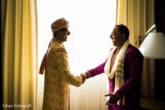 Indian groom greeting a special guest prior to the the ceremony Indian groom greeting a special guest prior to the the ceremony