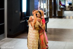 Tender moment between the Indian bride and groom Tender moment between the Indian bride and groom