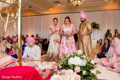Glamorous Indian bride walking in to wedding ceremony. Glamorous Indian bride walking in to wedding ceremony.