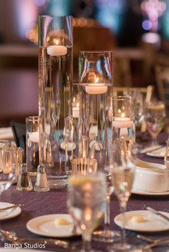 Indian wedding reception glassware table setup. Indian wedding reception glassware table setup.