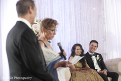 Groom's family delivers a speech at the Indian wedding reception Groom's family delivers a speech at the Indian wedding reception