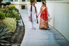 Lovely Indian bride and groom holding hands. Lovely Indian bride and groom holding hands.