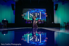 Dreamy Indian bride and groom at the dance floor capture. Dreamy Indian bride and groom at the dance floor capture.