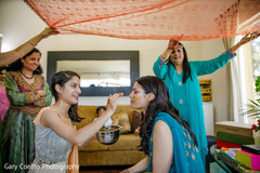 Indian bride getting the haldi paste on. Indian bride getting the haldi paste on.