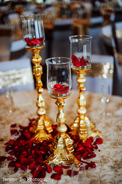 Unique Indian wedding reception table centerpiece. Unique Indian wedding reception table centerpiece.