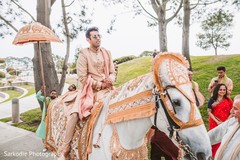 Elegant Indian groom riding baraat white horse. Elegant Indian groom riding baraat white horse.
