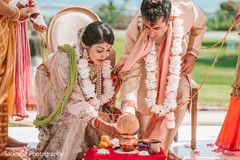 Indian couple holding during wedding ceremony ritual. Indian couple holding during wedding ceremony ritual.