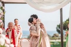 Incredible happy Indian couple at their wedding ceremony capture. Incredible happy Indian couple at their wedding ceremony capture.