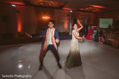 Indian bride and groom at their first reception dance. Indian bride and groom at their first reception dance.