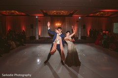 Lovely Indian couple enjoying their reception dance capture. Lovely Indian couple enjoying their reception dance capture.