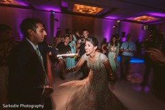 Lovely capture of Indian bride and groom at their reception dance. Lovely capture of Indian bride and groom at their reception dance.