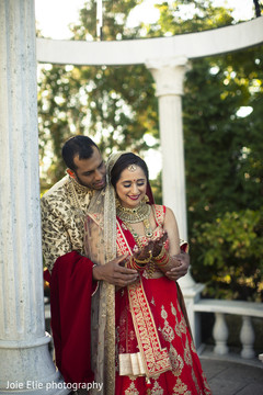 Indian groom looks at the beautiful mehndi designs. Indian groom looks at the beautiful mehndi designs.