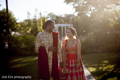Elegant Indian couple walk outdoors for the photo shoot Elegant Indian couple walk outdoors for the photo shoot
