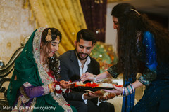 Traditional Indian bride and groom's pre-wedding ritual. Traditional Indian bride and groom's pre-wedding ritual.