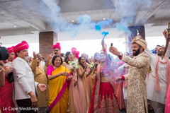 Indian groom with colorful smoke bombs Indian groom with colorful smoke bombs