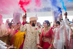 Indian wedding guests cheering the couple Indian wedding guests cheering the couple