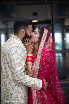 Indian bride and groom tender moment Indian bride and groom tender moment