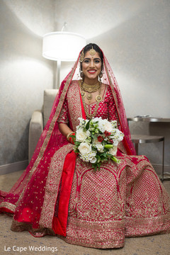 Gorgeous indian bride in a red and golden lengha Gorgeous indian bride in a red and golden lengha