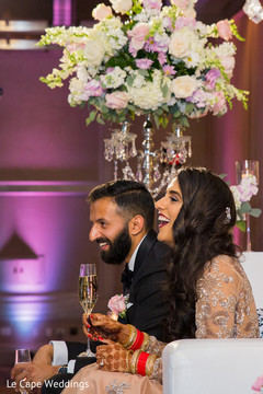 Indian newlyweds enjoy their drinks as the reception continues. Indian newlyweds enjoy their drinks as the reception continues.