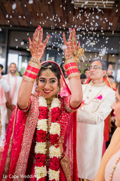 Beautiful maharani throws rice after the ceremony Beautiful maharani throws rice after the ceremony
