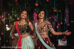 Capture of two beautiful guests wearing the sari and mehndi designs Capture of two beautiful guests wearing the sari and mehndi designs