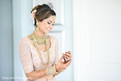 Indian bride putting bangles capture. Indian bride putting bangles capture.