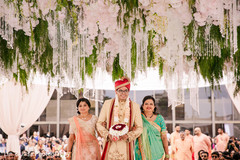 Indian groom makes his entrance along with his family Indian groom makes his entrance along with his family