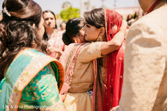 Indian bride receiving congratulations from the guests Indian bride receiving congratulations from the guests