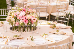Beautiful center piece in display at the Indian wedding reception table Beautiful center piece in display at the Indian wedding reception table