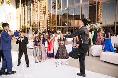 A magician entertains the little Indian guests during the reception A magician entertains the little Indian guests during the reception