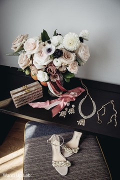 Marvelous Indian bridal jewelry, shoes and bouquet capture. Marvelous Indian bridal jewelry, shoes and bouquet capture.