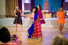 Beautiful guests performing a choreography at the Indian wedding reception Beautiful guests performing a choreography at the Indian wedding reception