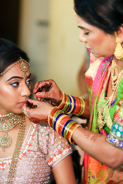Maharani being assisted by a special guest while getting ready Maharani being assisted by a special guest while getting ready