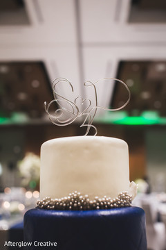 Indian wedding cake detail with the newlyweds initials Indian wedding cake detail with the newlyweds initials