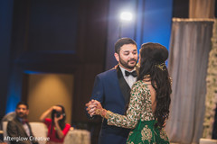 Indian newlyweds dance as the reception begins Indian newlyweds dance as the reception begins